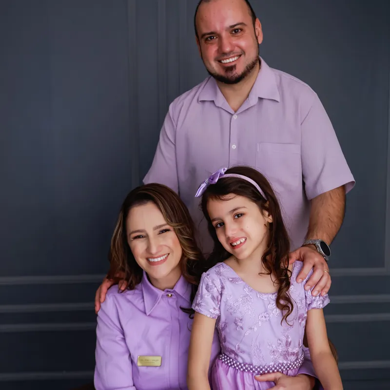 Dra. Aline Struckel com o marido e a filha